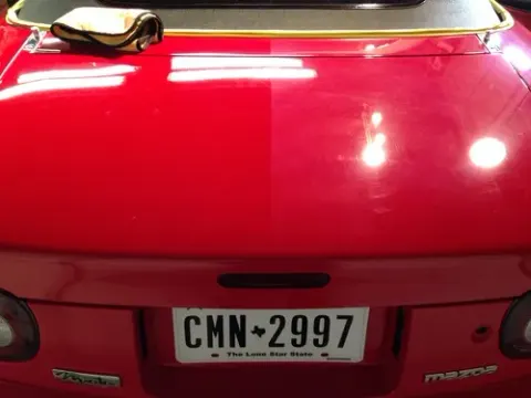 Mobile paint correction service setup at customer home in Florida