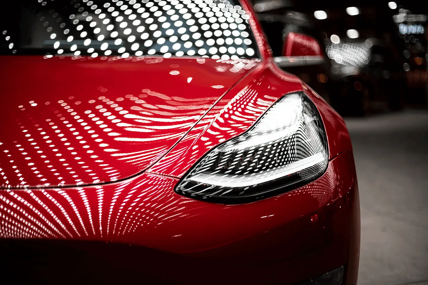 Car paint being decontaminated before ceramic coating application
